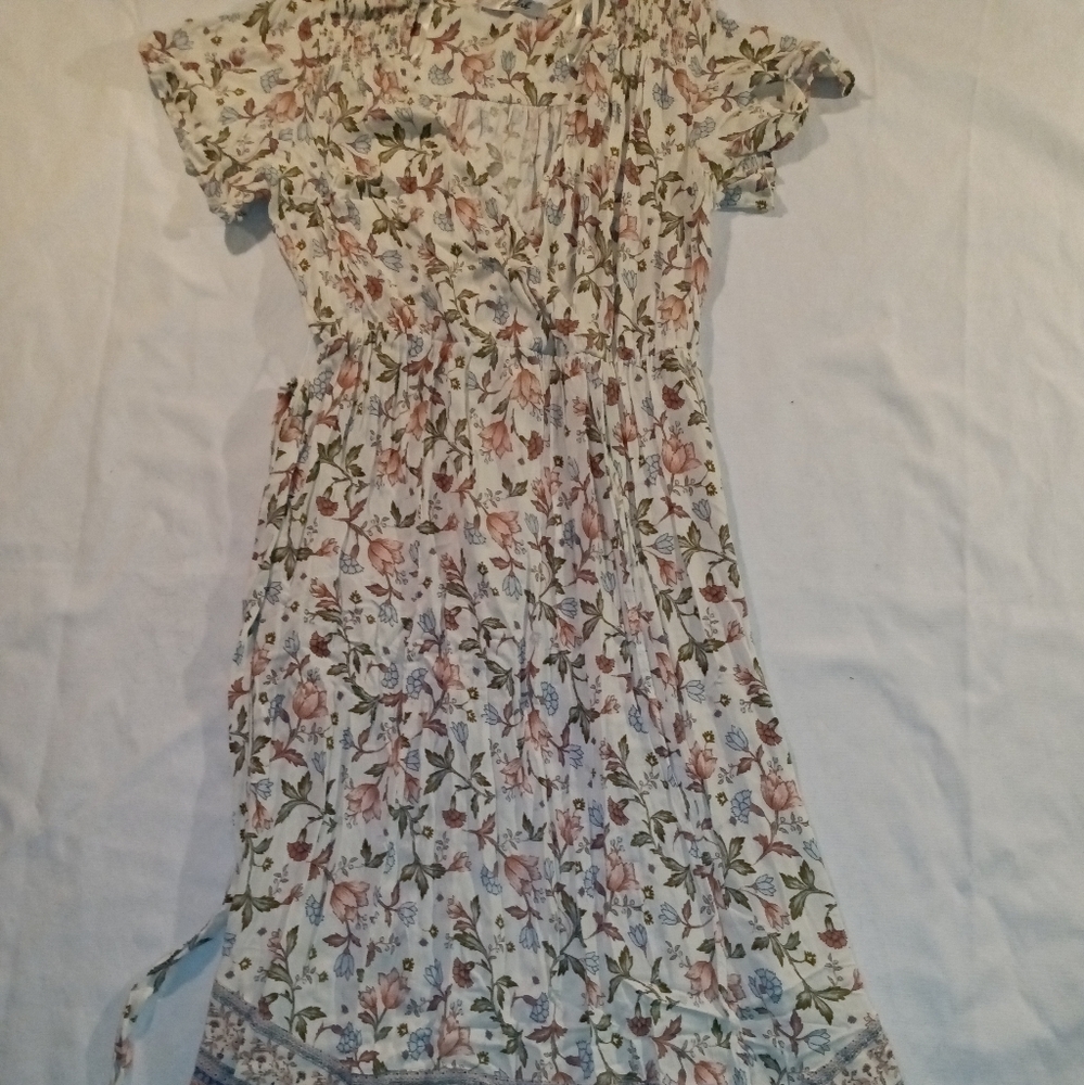 A Floral dress. Size M.